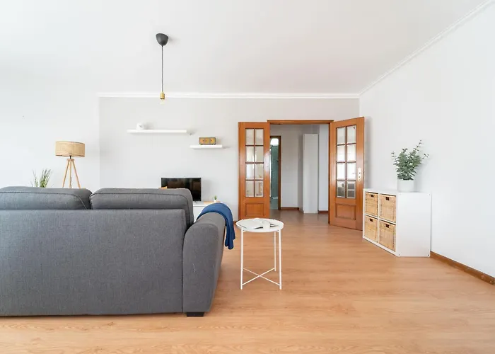 Beach Flat By House And People