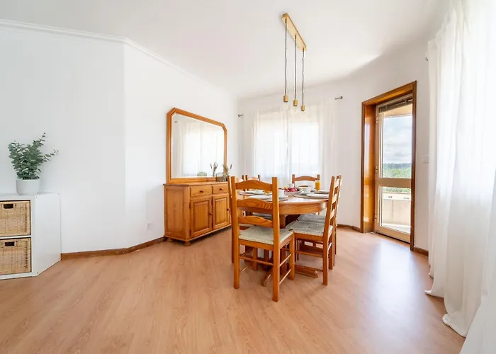 Beach Flat By House And People