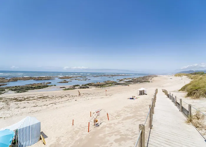 Beach Flat By House And People